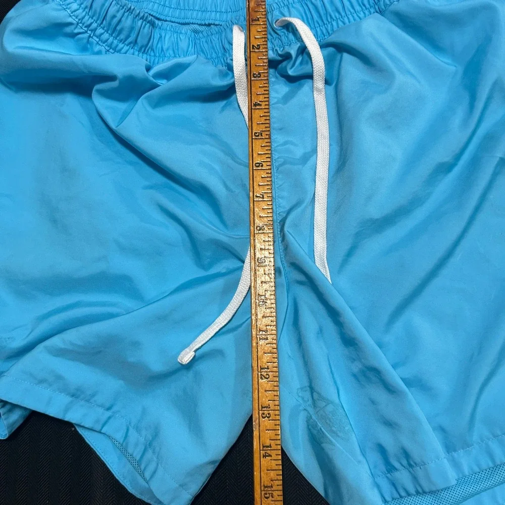 Nike Mens XXL Light Blue Mesh Lined Swim Trunks Shorts Embroidered Logo